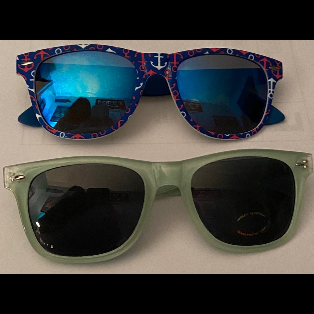 Set of two women’s sun glasses.